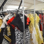 The Costume Workshop showing numerous costumes on hangers